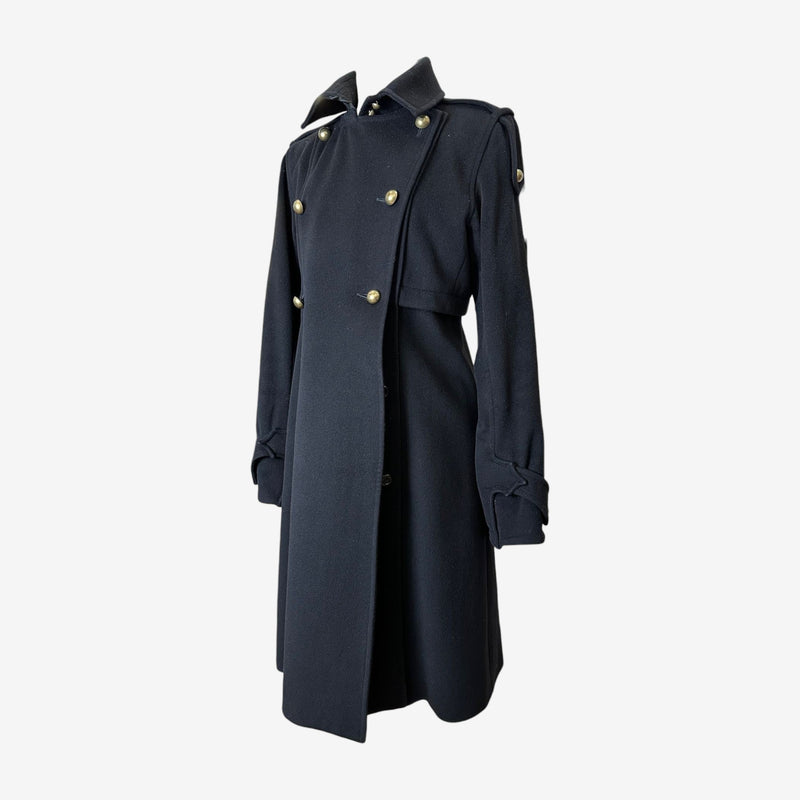 Navy military coat by Yves Saint Laurent, side profile showing fitted waist and full-length silhouette
