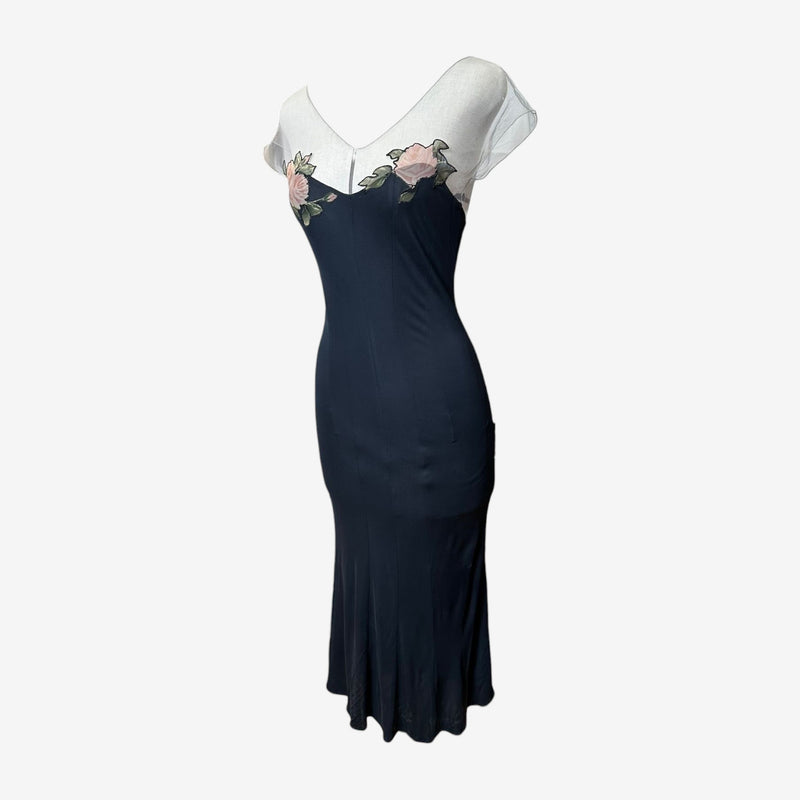Back view of black Blumarine midi dress showing zip closure and sheer organza sleeves