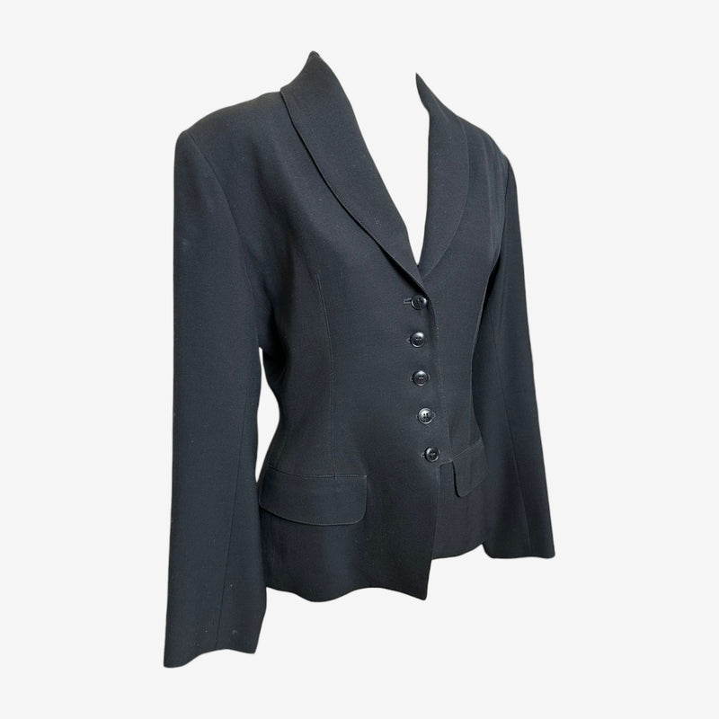 Navy wool Alaïa blazer, side view displaying fitted waist and structured shoulders