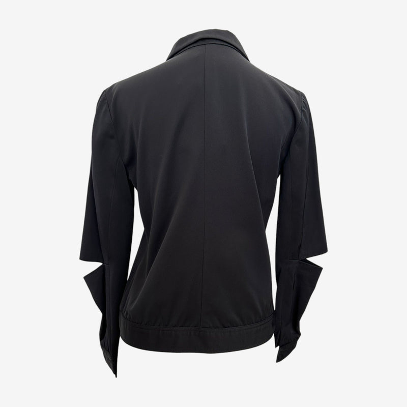 Detail of Helmut Lang blazer sleeve construction with wrapped fabric panel