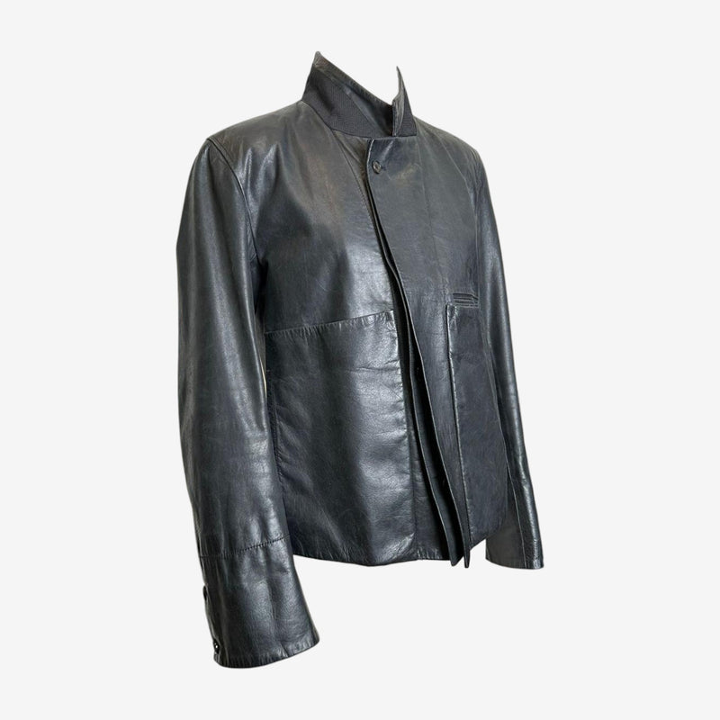 Black leather jacket by Ann Demeulemeester, chest pocket with topstitched detailing