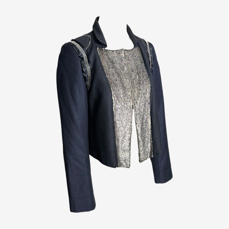 Close-up of silver metallic sequins on navy wool Chloé jacket front