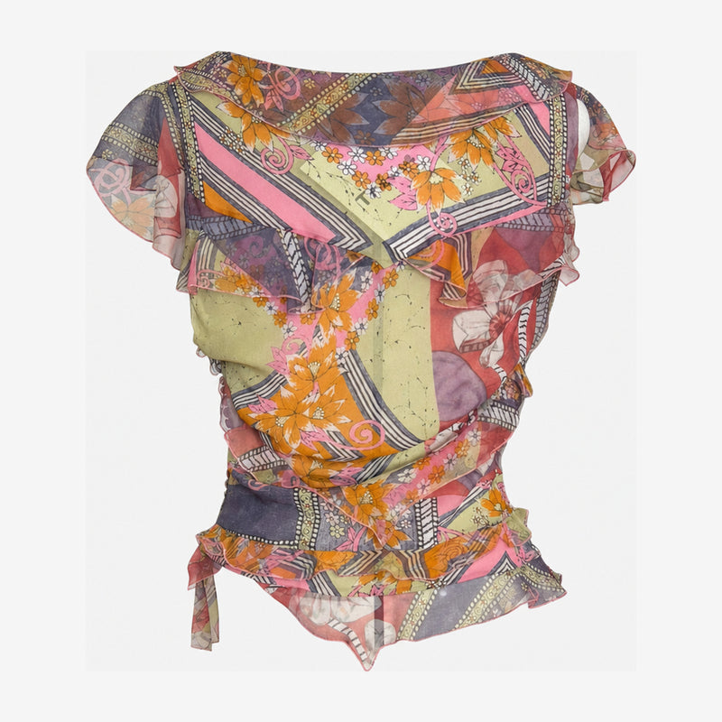 Detail of ruffled sleeve and floral-geometric print on silk chiffon