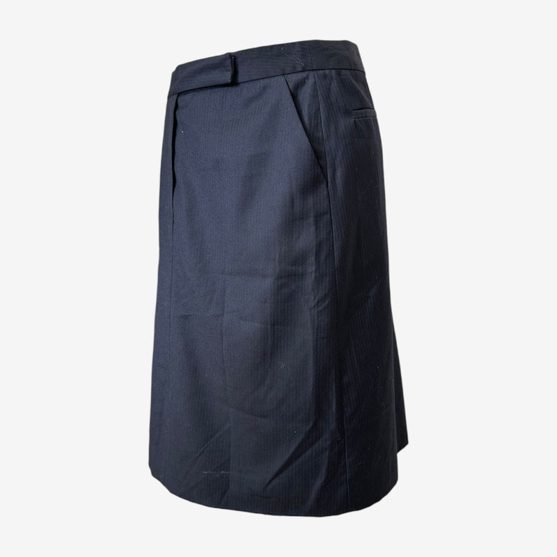 Navy pinstripe wool midi skirt by Maison Martin Margiela, side profile showing straight silhouette