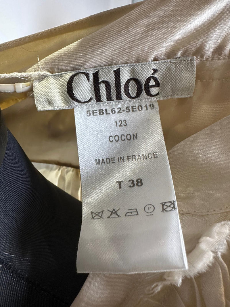 Back view of cream silk blouse by Chloé from S/S 2005 collection showing relaxed oversized silhouette