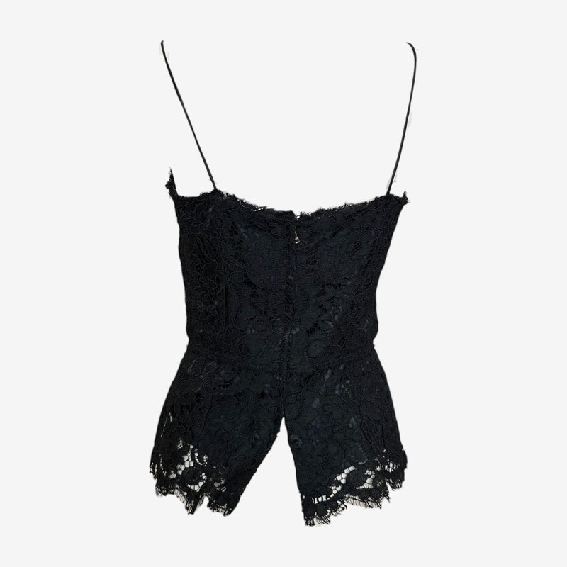 Black lace top by Dolce & Gabbana, detail of scalloped hem and lace pattern