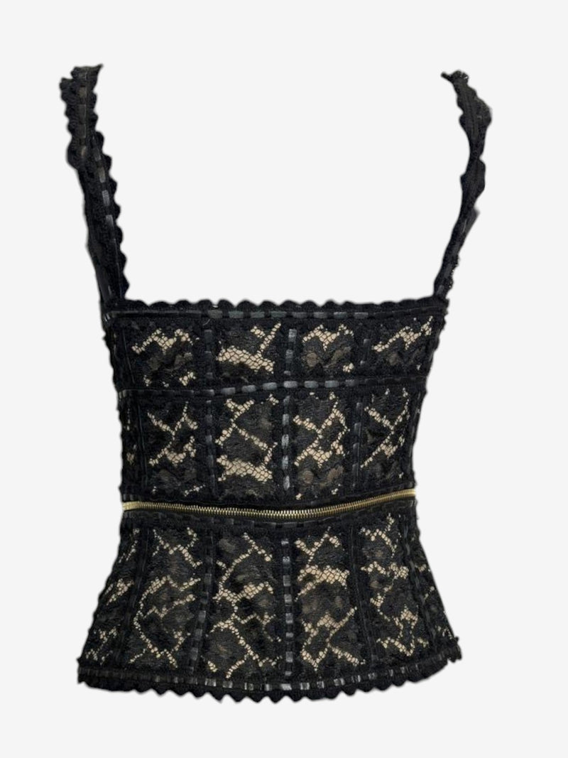 Black lace corset top detail of floral lace over nude mesh backing