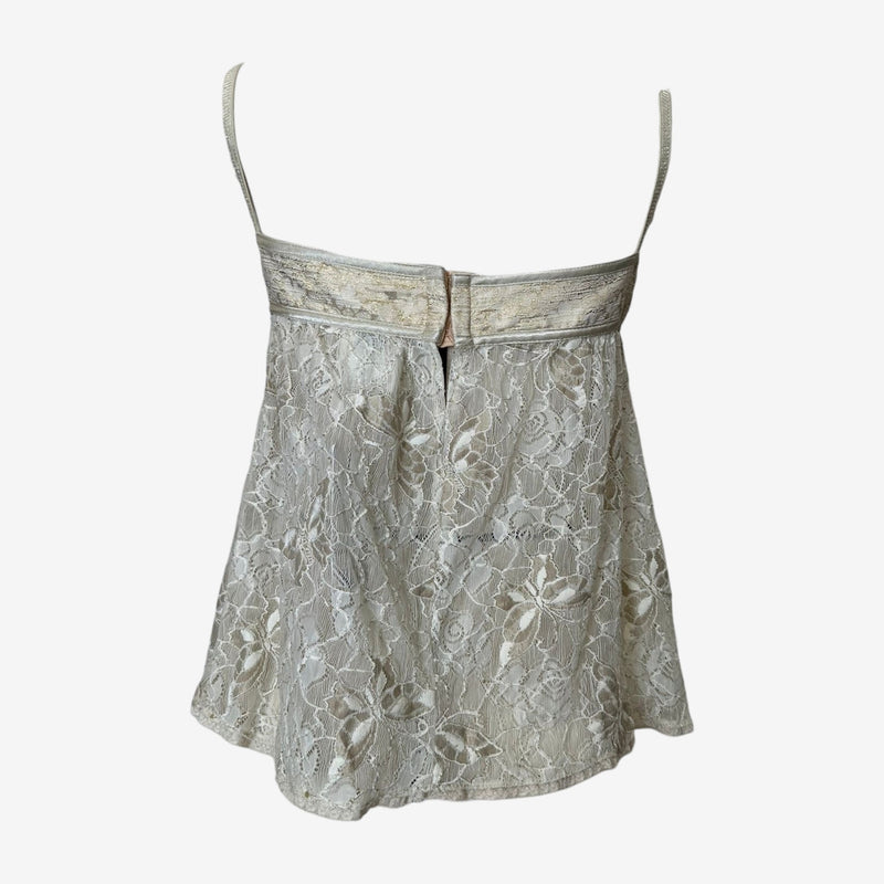 White lace bustier top by Dolce & Gabbana, back closure detail with hook-and-eye fastening