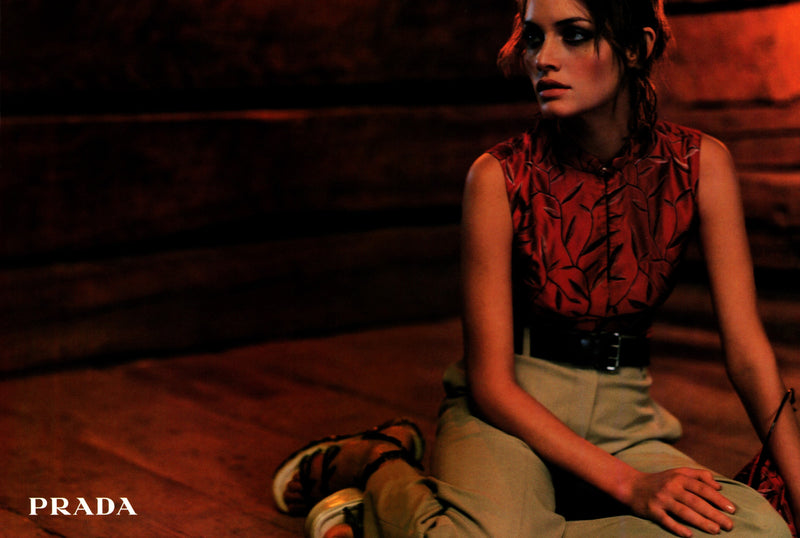 Deep red silk sleeveless top by Prada, embroidered leaf motif