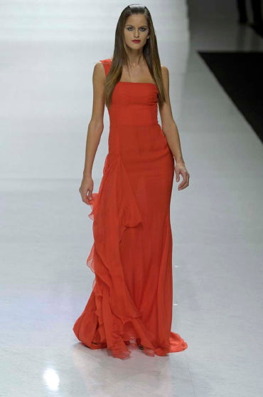 Red silk jersey gown by Valentino, asymmetric one-shoulder construction with angular cutout