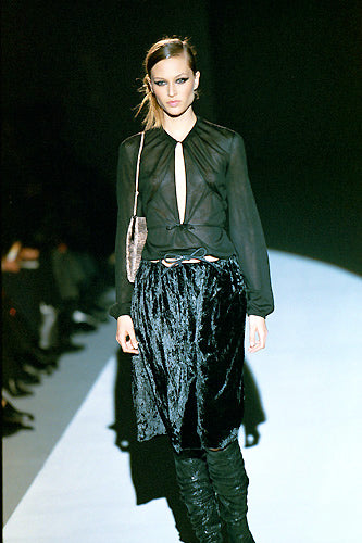 Black keyhole top by Tom Ford for Gucci, fitted bodice with long sleeves and curved hemline