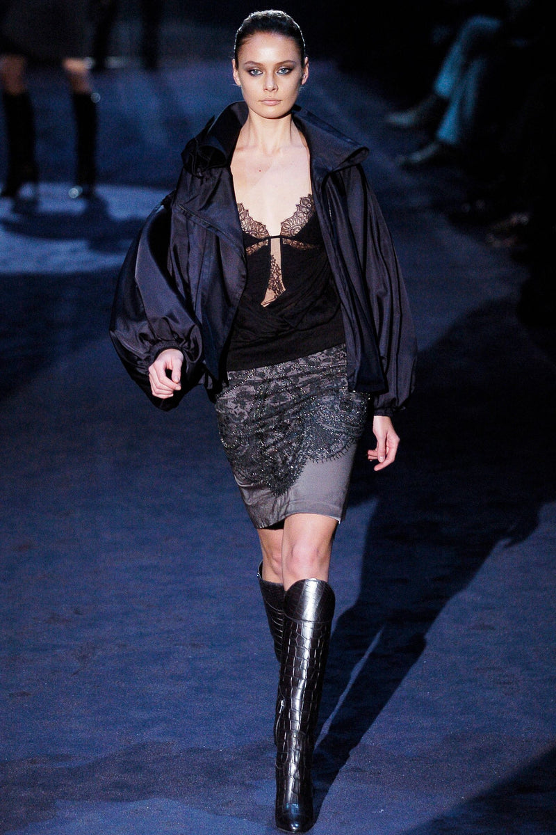 Charcoal grey beaded mesh pencil skirt by Gucci, full front view with ornate black beading